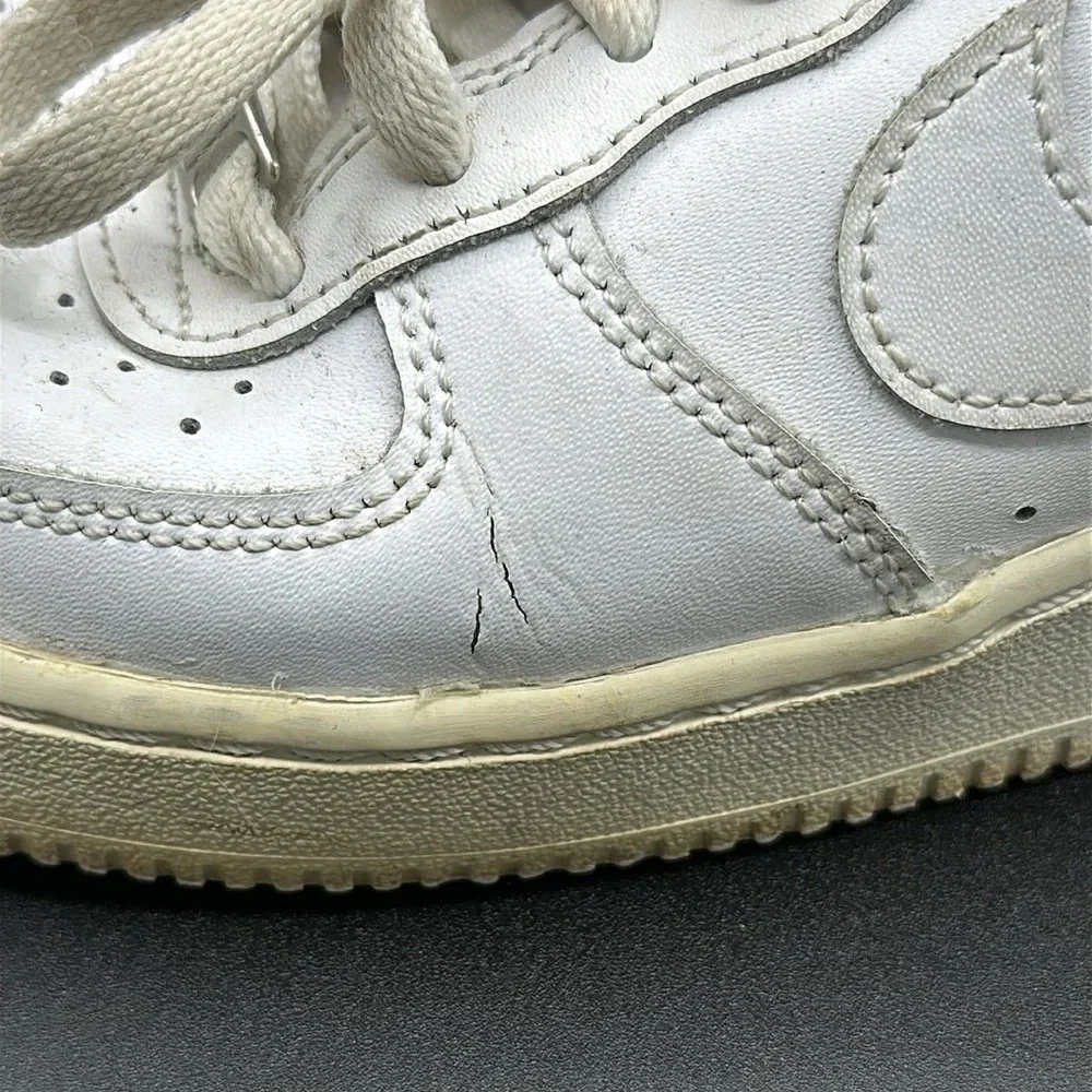 kids white Nike Air Force 1 sneakers size 3.5y